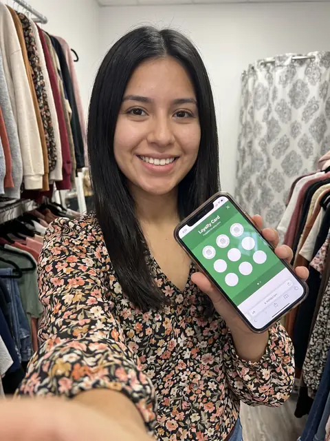 Clothing store: loyalty card on the phone